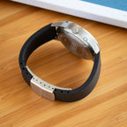 Bower Watch with black CTS FKM Rubber strap on a wooden surface